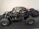 Losi Super Baja Rey - Rear Roll Cage Support. Fixed Price $15.99.